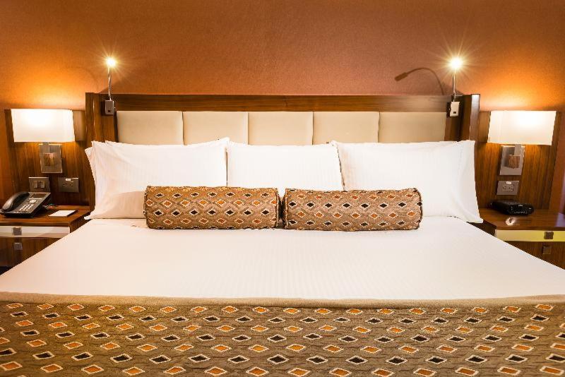 Dann Carlton Bogota Hotell Rom bilde A bed